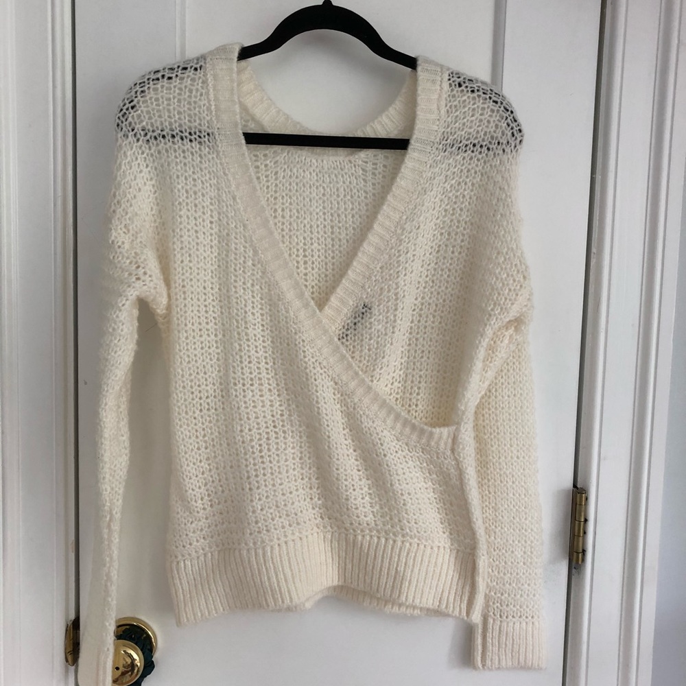 White cross sweater